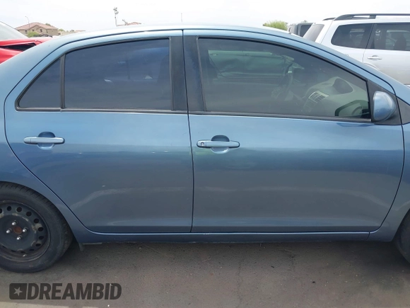2012 Toyota Yaris with VIN JTDBT4K34CL030720, listed as a IAAI auction lot 42222397 with 252,669 mi miles and . Bid and sale history available at DreamBid. Image 13.
