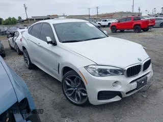2018 BMW X6 xDrive35i with VIN 5UXKU2C5XJ0X50408, listed as a IAAI auction lot 41798784 with 69,134 mi miles. Bid and sale history available at carsss.com. Image 1.