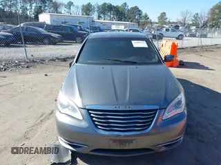 2012 Chrysler 200 Touring with VIN 1C3CCBBG9CN299980, listed as a IAAI auction lot 41689514 with 122,819 mi miles and . Bid and sale history available at carsss.com. Image 12.