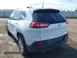 2018 Jeep Cherokee Latitude Plus with VIN 1C4PJLLB0JD584971, listed as a IAAI auction lot 41460976 with 64,100 mi miles. Bid and sale history available at carsss.com. Image 3.
