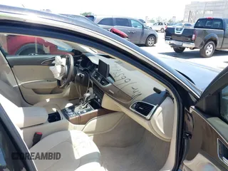 2016 Audi A6 Premium Plus with VIN WAUGFAFC0GN166596, listed as a IAAI auction lot 42526292 with 106,584 mi miles and . Bid and sale history available at DreamBid. Image 5.