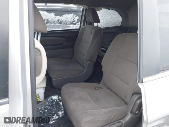 2014 Honda Odyssey LX with VIN 5FNRL5H22EB080346, listed as a IAAI auction lot 41282783 with 101,000 mi miles and . Bid and sale history available at carsss.com. Image 8.