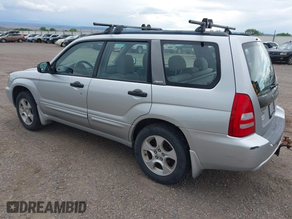 2003 Subaru Forester XS with VIN JF1SG65633G771008, listed as a IAAI auction lot 42451868 with 202,915 mi miles and . Bid and sale history available at DreamBid. Image 3.