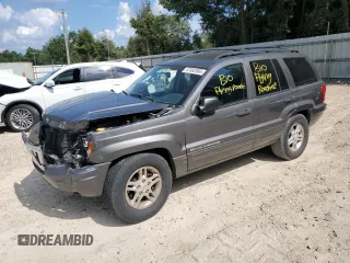 2002 Jeep Grand Cherokee with VIN 1J8GX48S12C255290, listed as a Copart auction lot 57832025 with 191,293 mi miles and Non repairable. Bid and sale history available at DreamBid. Image 1.