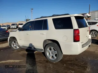 2015 Chevrolet Tahoe LT with VIN 1GNSCBKC2FR738042, listed as a Copart auction lot 84856214 with 144,325 mi miles and Salvage title. Bid and sale history available at DreamBid. Image 2.