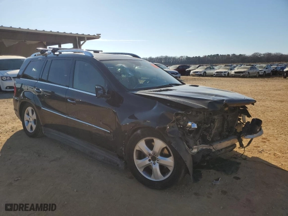 2012 Mercedes-Benz GL-Class GL 450 with VIN 4JGBF7BE7CA775592, listed as a Copart auction lot 86571404 with 142,092 mi miles and Salvage Title. Bid and sale history available at carsss.com. Image 4.