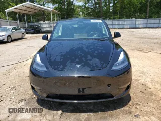 2024 Tesla Model Y z VIN 7SAYGDED2RA329802, wystawiony jako Copart lot #57748805 z przebiegiem 19 391 mil mil oraz Szkoda całkowita • Salvage title. Historia ofert i sprzedaży dostępna na DreamBid. Obrazek 5.