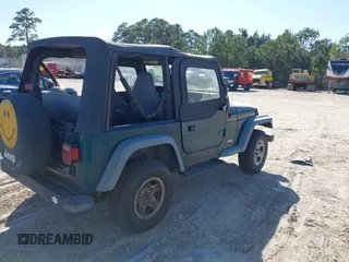 1997 Jeep Wrangler SE with VIN 1J4FY29P2VP492327, listed as a IAAI auction lot 41824808 with 156,646 mi miles. Bid and sale history available at carsss.com. Image 4.