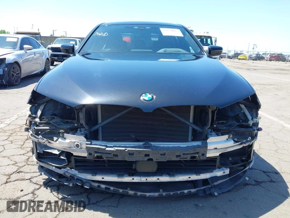 2017 BMW 5 Series 540i with VIN WBAJE5C31HG477822, listed as a IAAI auction lot 42174024 with 88,846 mi miles and . Bid and sale history available at carsss.com. Image 6.