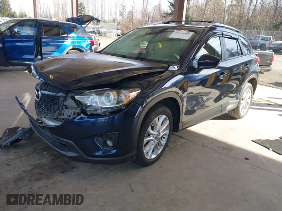 2014 Mazda CX-5 Grand Touring with VIN JM3KE2DY6E0394172, listed as a IAAI auction lot 41698468 with 89,554 mi miles. Bid and sale history available at carsss.com. Image 2.