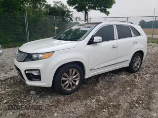 2013 Kia Sorento SX z VIN 5XYKWDA20DG412272, wystawiony jako Copart lot #60263145 z przebiegiem Nie podano mil oraz Czysty tytuł • Clean title. Historia ofert i sprzedaży dostępna na DreamBid. Obrazek 1.