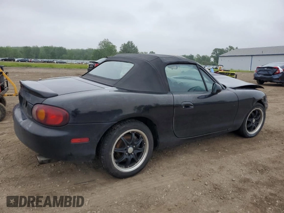 1999 Mazda MX-5 Miata with VIN JM1NB3531X0102616, listed as a Copart auction lot 59779415 with 194,494 mi miles and Salvage title. Bid and sale history available at DreamBid. Image 3.