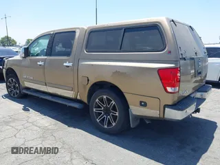 2005 Nissan Titan LE with VIN 1N6AA07B95N508001, listed as a IAAI auction lot 42656008 with 196,542 mi miles and . Bid and sale history available at DreamBid. Image 3.