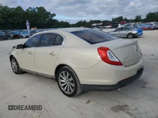 2014 Lincoln MKS with VIN 1LNHL9DKXEG612758, listed as a Copart auction lot 53230065 with 98,863 mi miles and Salvage Title. Bid and sale history available at carsss.com. Image 2.