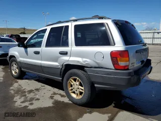 2003 Jeep Grand Cherokee Laredo with VIN 1J4GW48S13C556129, listed as a Copart auction lot 50389215 with 193,934 mi miles and Salvage Title. Bid and sale history available at carsss.com. Image 2.