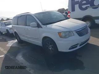 2012 Chrysler Town & Country Touring with VIN 2C4RC1BGXCR410507, listed as a IAAI auction lot 41215704 with 161,501 mi miles. Bid and sale history available at carsss.com. Image 1.