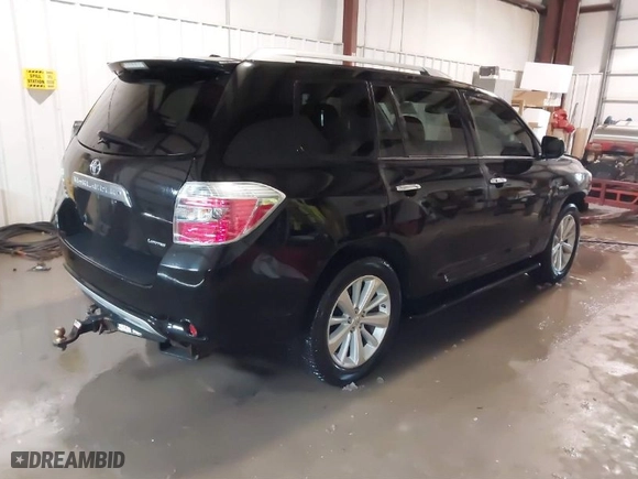 2009 Toyota Highlander Hybrid Limited with VIN JTEEW44A192035643, listed as a IAAI auction lot 41330015 with 200,839 mi miles. Bid and sale history available at carsss.com. Image 4.