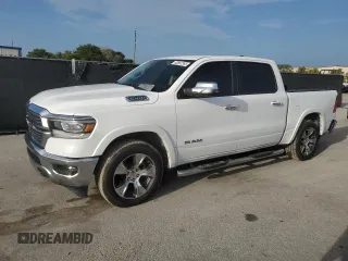 2022 Ram 1500 Laramie with VIN 1C6SRFJTXNN283888, listed as a Copart auction lot 60867365 with 124,270 mi miles and Salvage title. Bid and sale history available at DreamBid. Image 1.