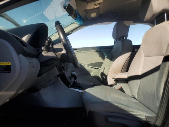 2015 Hyundai Accent Sport with VIN KMHCU5AE6FU234035, listed as a Copart auction lot 74429244 with 228,512 mi miles and Salvage Title. Bid and sale history available at carsss.com. Image 7.