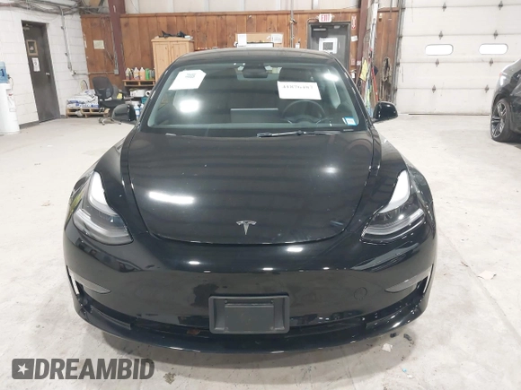 2023 Tesla Model 3 with VIN 5YJ3E1EA5PF552241, listed as a IAAI auction lot 41876487 with 18,533 mi miles and . Bid and sale history available at carsss.com. Image 12.