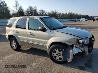 2005 Ford Escape Limited with VIN 1FMYU94195KB35872, listed as a Copart auction lot 63285755 with 145,638 mi miles and Salvage title. Bid and sale history available at DreamBid. Image 4.