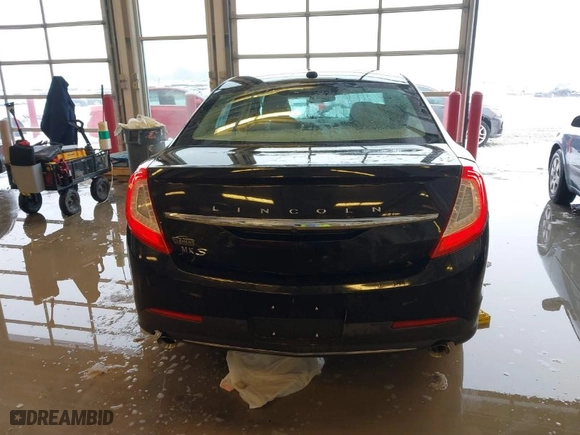 2015 Lincoln MKS with VIN 1LNHL9DK9FG604085, listed as a IAAI auction lot 41251811 with 58502 miles. Bid and sale history available at carsss.com. Image 17.