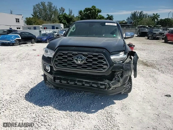 2021 Toyota Tacoma 2WD SR5 with VIN 5TFAZ5CNXMX099521, listed as a Copart auction lot 50082865 with 60,676 mi miles and Salvage Title. Bid and sale history available at carsss.com. Image 13.