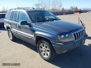 2001 Jeep Grand Cherokee Laredo with VIN 1J4GW48N11C558857, listed as a IAAI auction lot 41527331 with 187,513 mi miles. Bid and sale history available at carsss.com. Image 1.