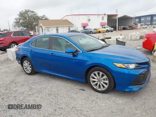 2020 Toyota Camry LE with VIN 4T1L11AK5LU310671, listed as a IAAI auction lot 41732306 with 61,379 mi miles and . Bid and sale history available at carsss.com. Image 14.