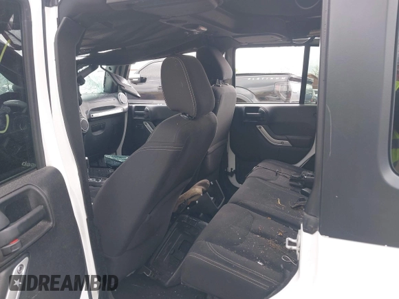 2016 Jeep Wrangler Unlimited Sahara with VIN 1C4BJWEG8GL129577, listed as a IAAI auction lot 42184373 with 185,761 mi miles and . Bid and sale history available at DreamBid. Image 8.