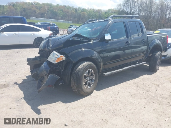 2014 Nissan Frontier SV with VIN 1N6AD0EV0EN758585, listed as a IAAI auction lot 41943169 with 186,214 mi miles and . Bid and sale history available at DreamBid. Image 18.