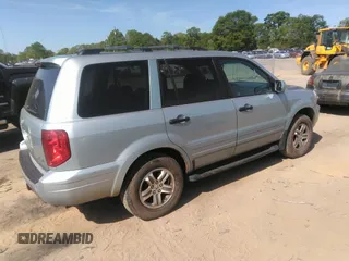 2003 Honda Pilot EX z VIN 2HKYF185X3H559442, wystawiony jako IAAI lot #42051437 z przebiegiem 274 515 mil mil oraz . Historia ofert i sprzedaży dostępna na DreamBid. Obrazek 4.