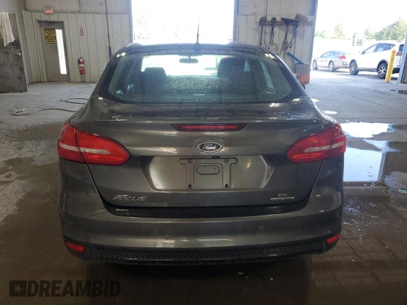 2015 Ford Focus SE with VIN 1FADP3F29FL310622, listed as a Copart auction lot 63591065 with 119,957 mi miles and Salvage title. Bid and sale history available at DreamBid. Image 6.