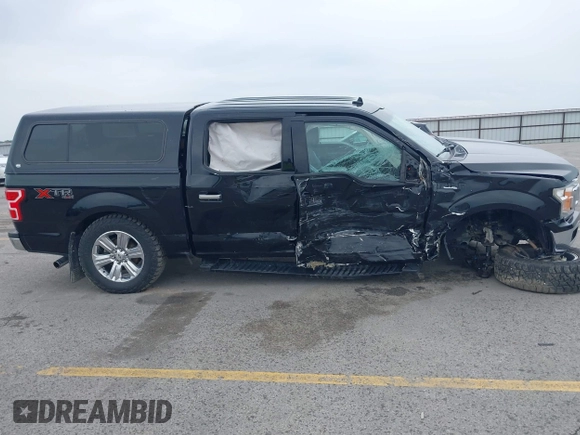 2018 Ford F-150 XL with VIN 1FTEW1E5XJKC37082, listed as a IAAI auction lot 42335721 with 167,401 mi miles and . Bid and sale history available at DreamBid. Image 12.