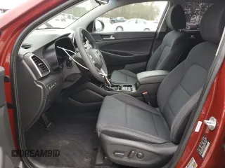 2019 Hyundai Tucson Sport with VIN KM8J33AL0KU875219, listed as a Copart auction lot 86816254 with 82,829 mi miles and Salvage Title. Bid and sale history available at carsss.com. Image 7.