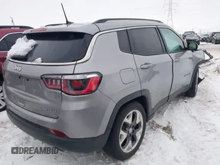 2019 Jeep Compass Limited with VIN 3C4NJCCB0KT819355, listed as a IAAI auction lot 41304561 with 69,892 mi miles. Bid and sale history available at carsss.com. Image 4.