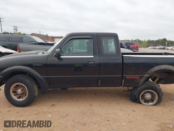 2003 Ford Ranger XL with VIN 1FTYR14U43PB67839, listed as a IAAI auction lot 41950004 with 130,164 mi miles. Bid and sale history available at carsss.com. Image 14.