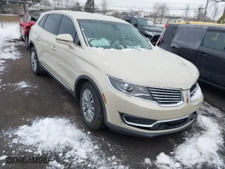 2016 Lincoln MKX Select with VIN 2LMTJ8KR0GBL38074, listed as a IAAI auction lot 41635344 with 96,239 mi miles. Bid and sale history available at carsss.com. Image 1.