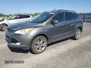 2013 Ford Escape SEL with VIN 1FMCU9H98DUD73158, listed as a Copart auction lot 58650745 with 326,377 mi miles and Clean title. Bid and sale history available at DreamBid. Image 1.