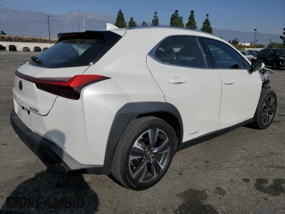 2022 Lexus UX 250h with VIN JTHX9JBH2N2056285, listed as a Copart auction lot 87221214 with 33,377 mi miles and Salvage title. Bid and sale history available at DreamBid. Image 3.