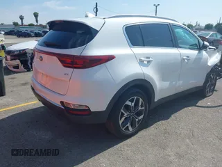 2021 Kia Sportage EX with VIN KNDPN3ACXM7936960, listed as a IAAI auction lot 42115357 with 27,964 mi miles and . Bid and sale history available at DreamBid. Image 4.