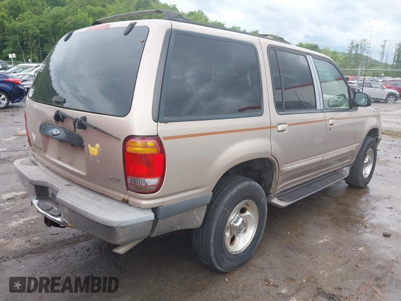 1998 Ford Explorer XL z VIN 1FMZU34E5WZA20652, wystawiony jako IAAI lot #42363619 z przebiegiem 383 213 mil mil oraz . Historia ofert i sprzedaży dostępna na DreamBid. Obrazek 4.
