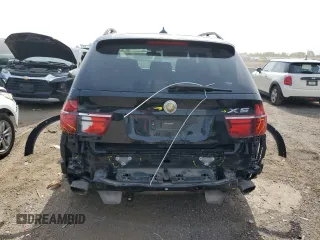 2012 BMW X5 50i with VIN 5UXZV8C59CL424356, listed as a Copart auction lot 54763725 with 107,712 mi miles and Salvage title. Bid and sale history available at DreamBid. Image 6.