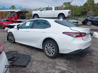 2023 Toyota Camry LE with VIN 4T1C11AK9PU158190, listed as a IAAI auction lot 41666927 with 92,730 mi miles and . Bid and sale history available at DreamBid. Image 3.