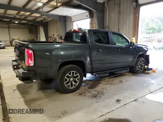 2015 GMC Canyon 4WD SLE with VIN 1GTG6BE37F1118335, listed as a Copart auction lot 85271264 with 58,679 mi miles and Salvage Title. Bid and sale history available at carsss.com. Image 3.