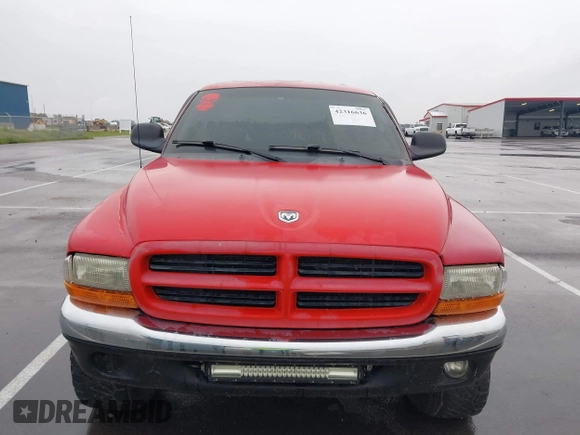 2001 Dodge Dakota Sport z VIN 1B7GG2AN91S110843, wystawiony jako IAAI lot #42316636 z przebiegiem 263 073 mil mil oraz . Historia ofert i sprzedaży dostępna na DreamBid. Obrazek 6.