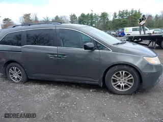 2012 Honda Odyssey EX with VIN 5FNRL5H42CB086159, listed as a IAAI auction lot 42096834 with 208,701 mi miles. Bid and sale history available at carsss.com. Image 13.