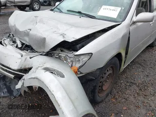 2003 Toyota Camry LE with VIN 4T1BE32K63U755835, listed as a IAAI auction lot 41976402 with 215,788 mi miles and . Bid and sale history available at DreamBid. Image 6.