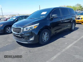 2017 Kia Sedona LX with VIN KNDMB5C17H6319935, listed as a IAAI auction lot 42025352 with 74,561 mi miles. Bid and sale history available at carsss.com. Image 2.