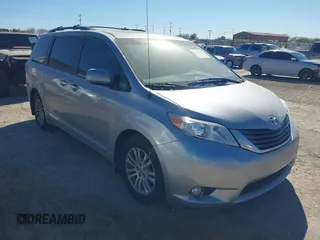 2014 Toyota Sienna XLE with VIN 5TDYK3DC6ES420613, listed as a IAAI auction lot 41207273 with 58,775 mi miles. Bid and sale history available at carsss.com. Image 1.
